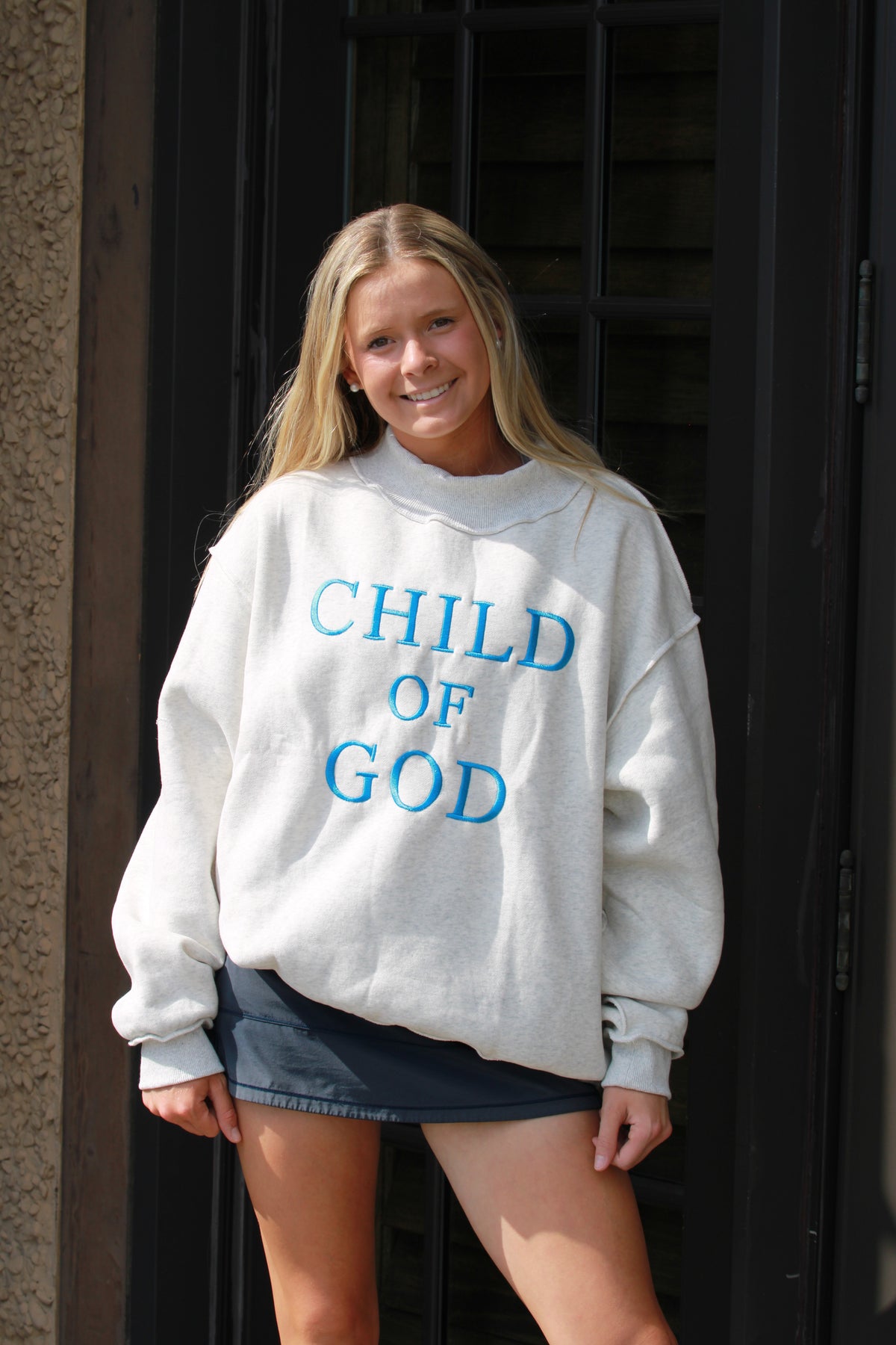 Claudia Child of God Mockneck