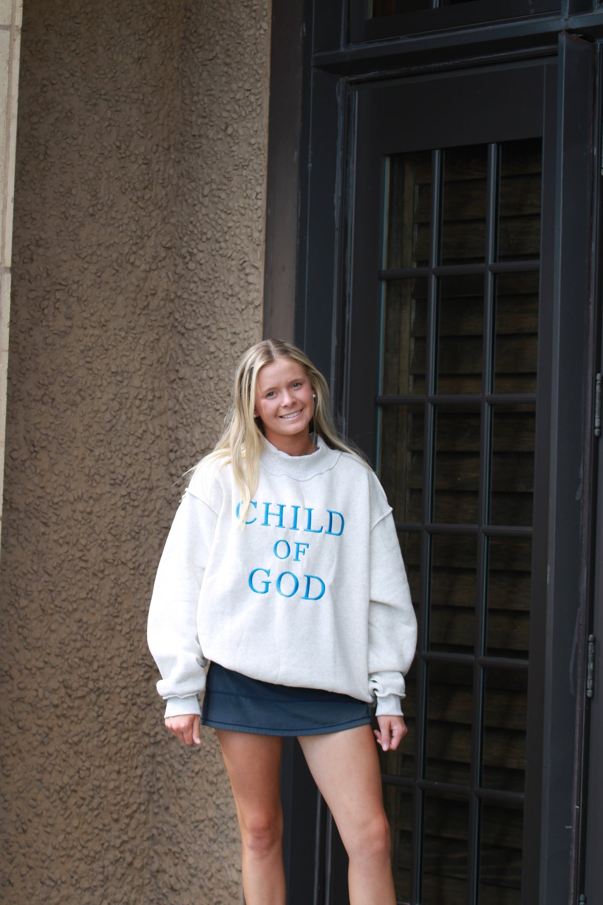Claudia Child of God Mockneck