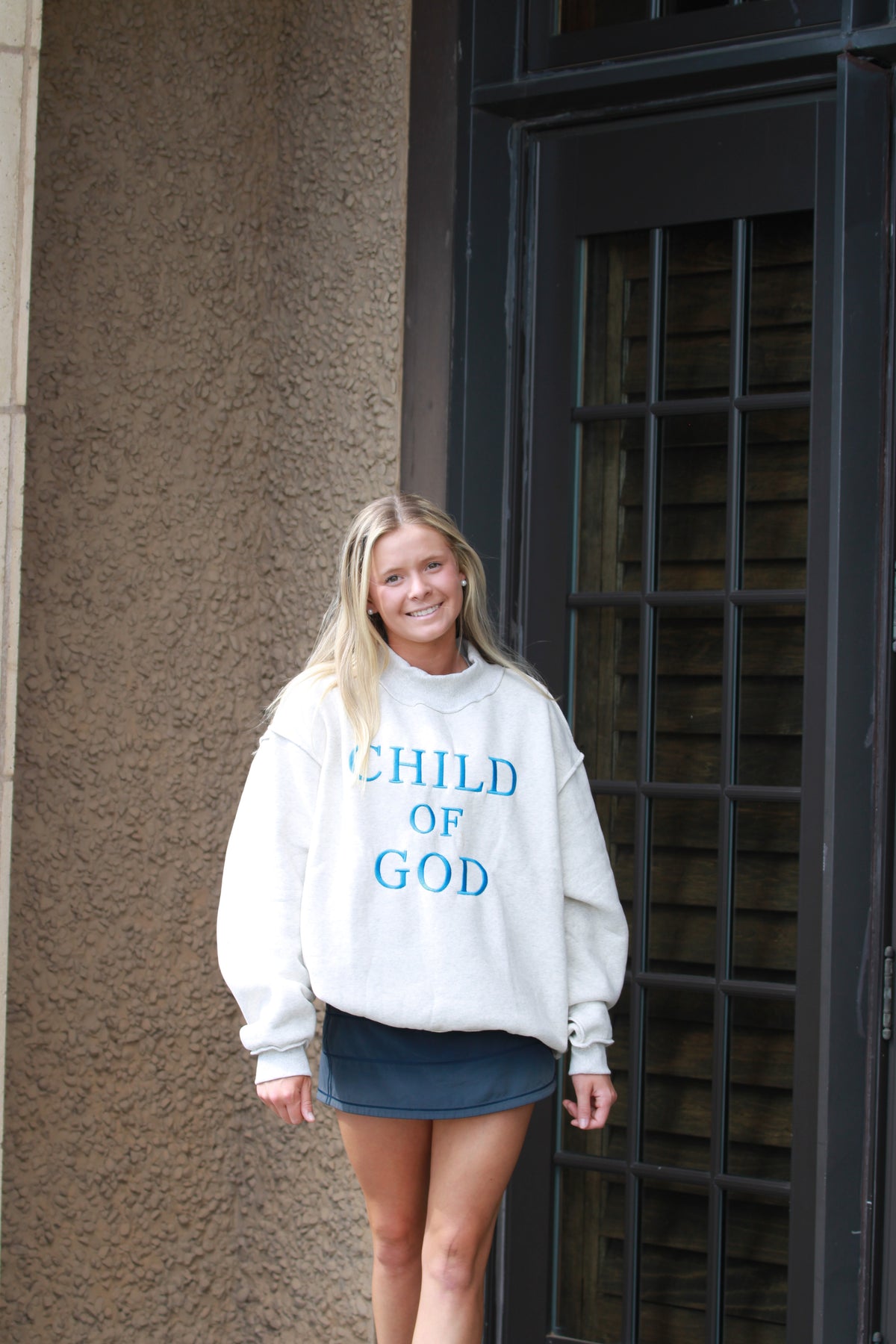 Claudia Child of God Mockneck